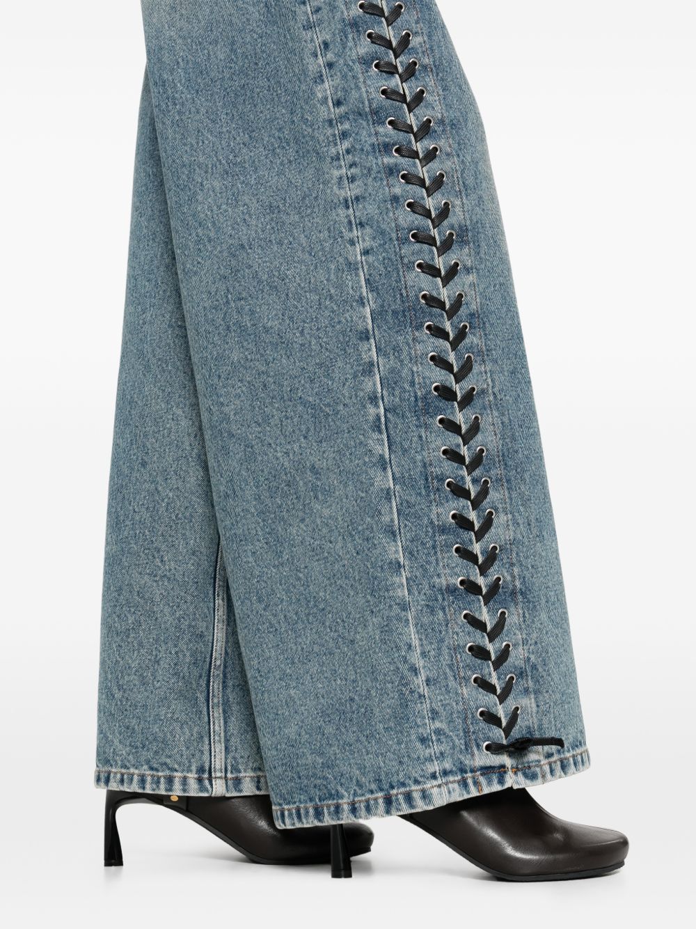 Jeans a cinque tasche con lacci blu sul fianco