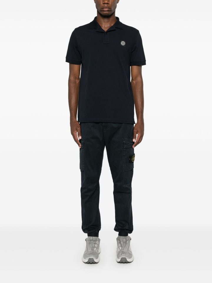 Polo con motivo Compass