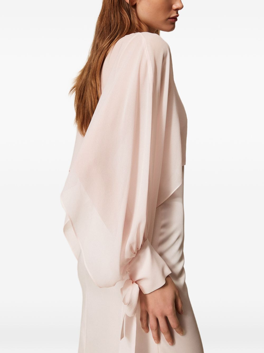 Blusa crop con fiocco