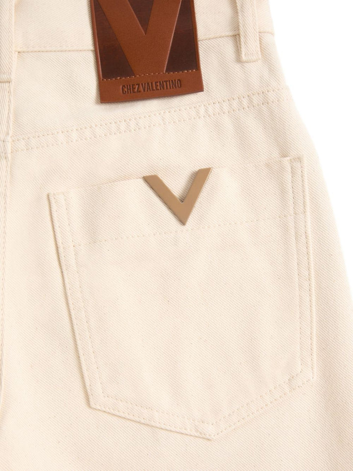 Jeans con dettaglio V