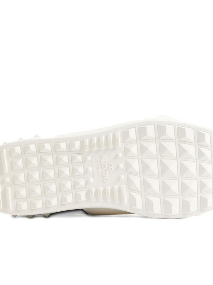 Sneakers "Open " in pelle borchie in gomma sul retro